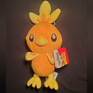 This is an 8-inch, officially licensed Pokémon Torchic plush toy by Jazwares. 